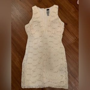 White and gold sequin dress